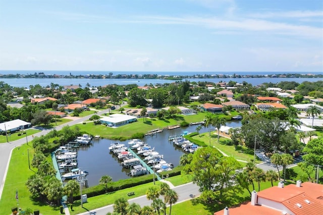 drone / aerial view with a water view