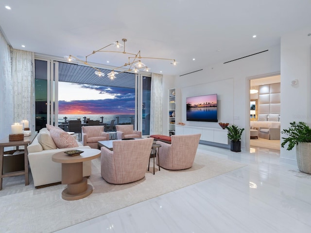 living room with an inviting chandelier