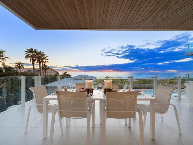 balcony at dusk with a water view