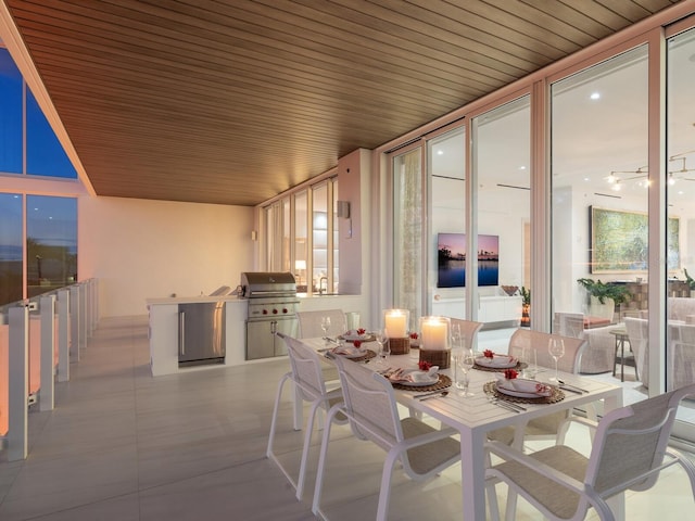 4651 Gulf Of Mexico Dr Unit 402, Longboat Key, FL 34228 - dining space with wooden ceiling and expansive windows
