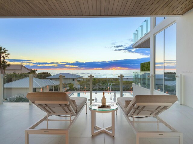 view of balcony at dusk