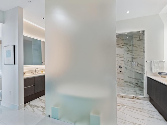 4651 Gulf Of Mexico Dr Unit 402, Longboat Key, FL 34228 - full bathroom featuring a marble finish shower, marble tiled floors, vanity, and recessed lighting
