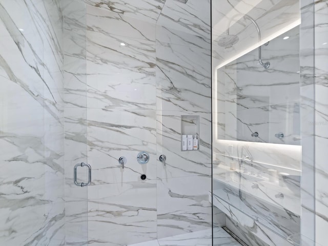 4651 Gulf Of Mexico Dr Unit 402, Longboat Key, FL 34228 - full bathroom featuring a marble finish shower