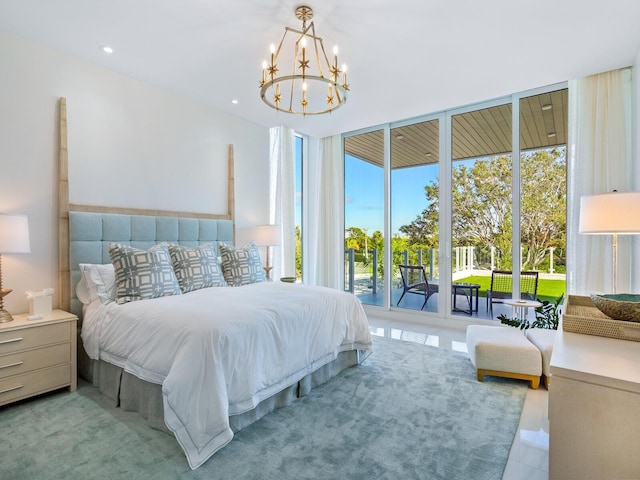 bedroom with access to outside, light colored carpet, and a notable chandelier