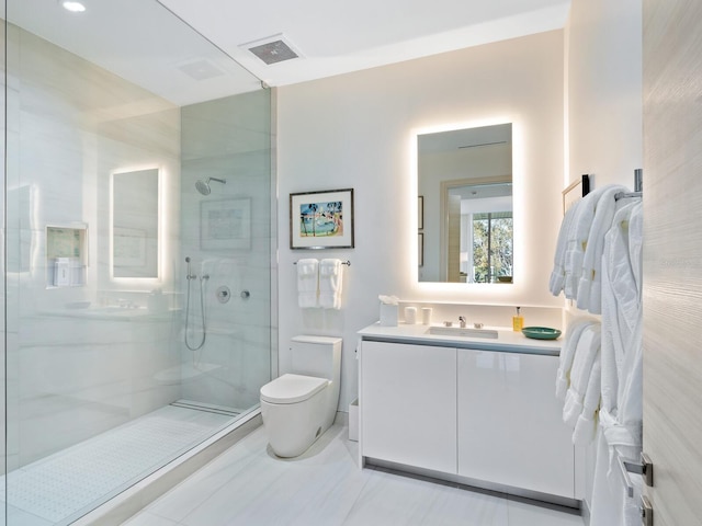 4651 Gulf Of Mexico Dr Unit 402, Longboat Key, FL 34228 - full bathroom featuring a walk in shower, toilet, vanity, and tile patterned flooring