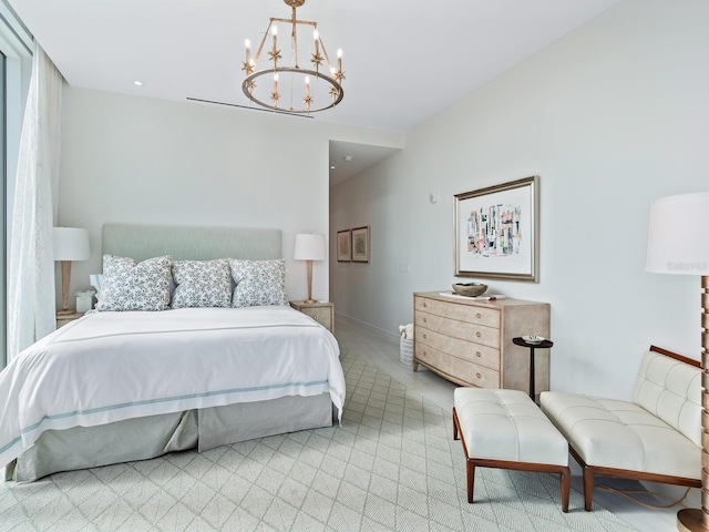 bedroom featuring a chandelier and light carpet