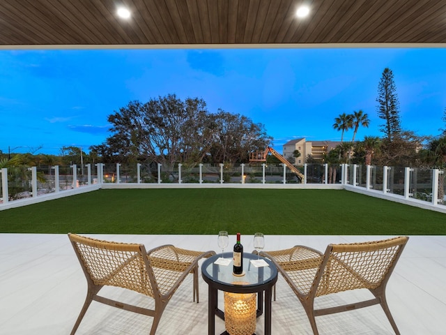 balcony at dusk with a patio