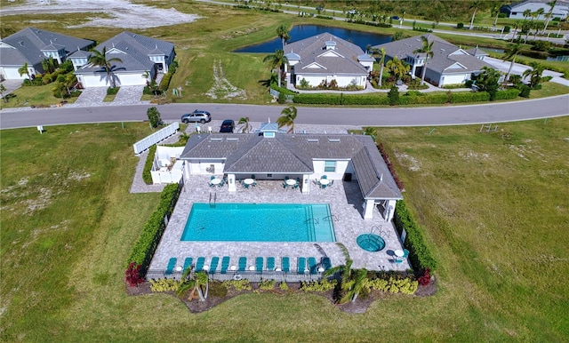 birds eye view of property featuring a residential view and a water view