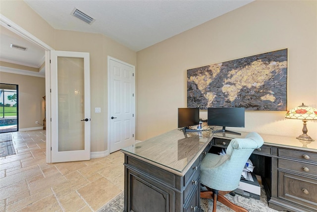 office with crown molding and french doors