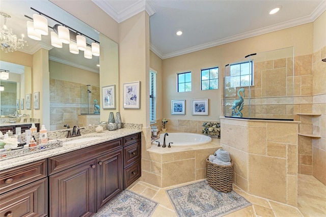 bathroom with vanity, a chandelier, plus walk in shower, and ornamental molding