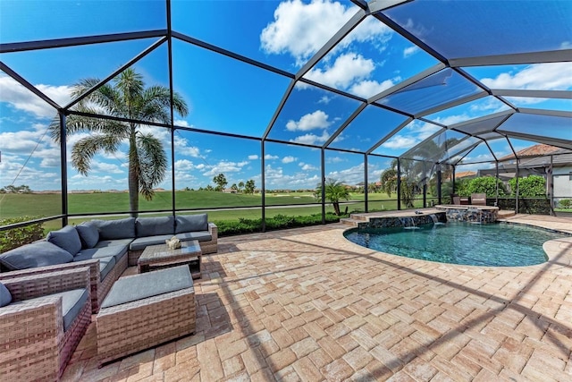 view of swimming pool featuring a patio, pool water feature, glass enclosure, and outdoor lounge area