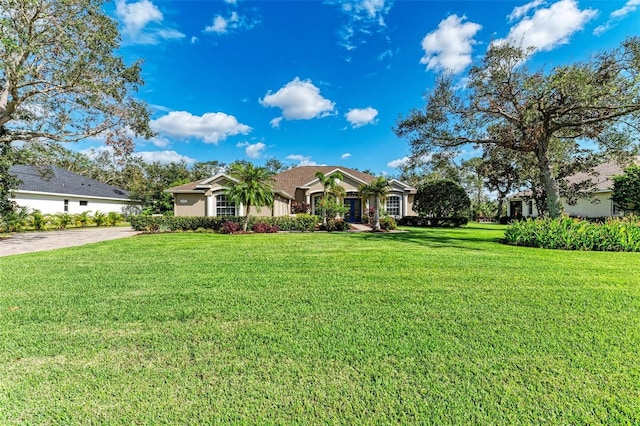 ranch-style home with a front lawn