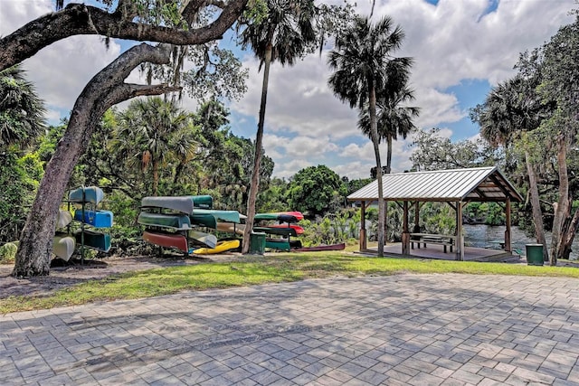 view of home's community featuring a gazebo and a water view