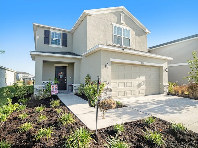 craftsman house featuring a garage