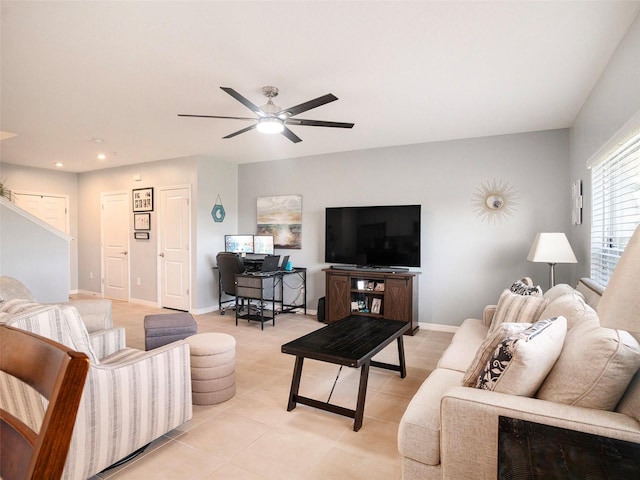 living room featuring light tile patterned flooring and ceiling fan