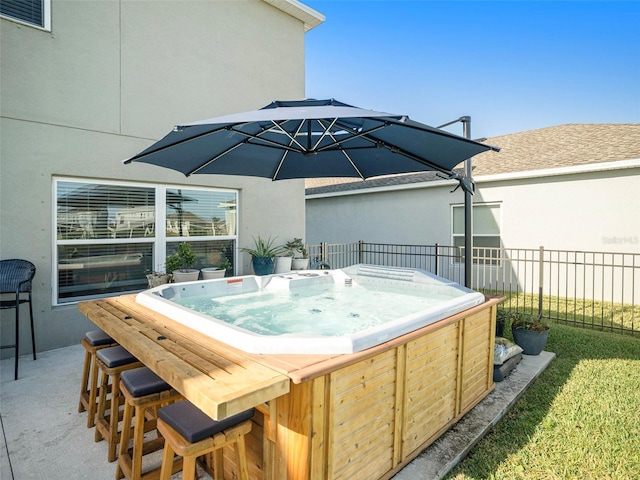 view of patio featuring a hot tub