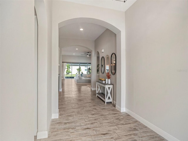 hall with light wood-type flooring