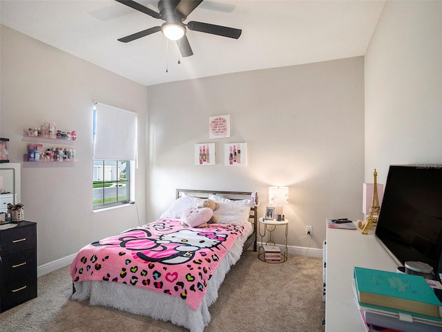 bedroom with ceiling fan and light colored carpet