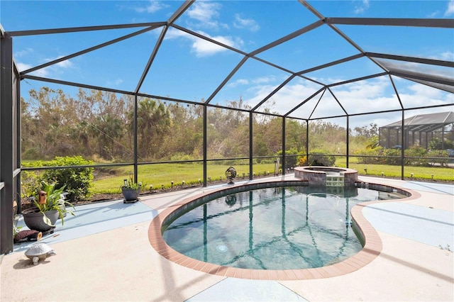 view of swimming pool with glass enclosure, an in ground hot tub, a lawn, and a patio