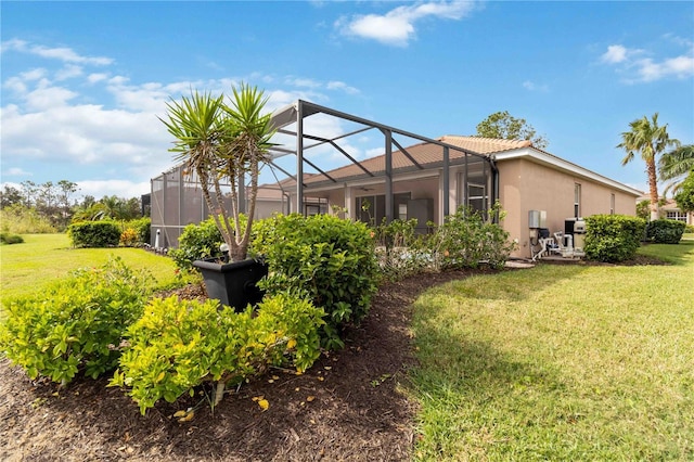 view of yard with a lanai