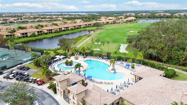115 Winding River Trl, Bradenton, FL 34212 - aerial view of residential area featuring a pool area, a local golf course, and a large body of water