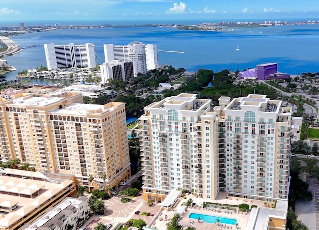 birds eye view of property with a water view