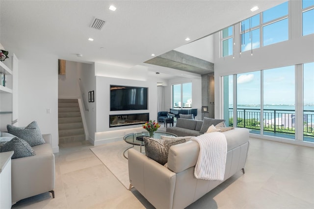 living room with a textured ceiling