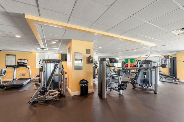 workout area with a drop ceiling