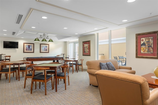 carpeted dining space featuring billiards and ornamental molding