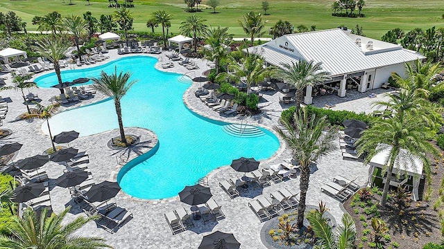 view of swimming pool featuring a patio area