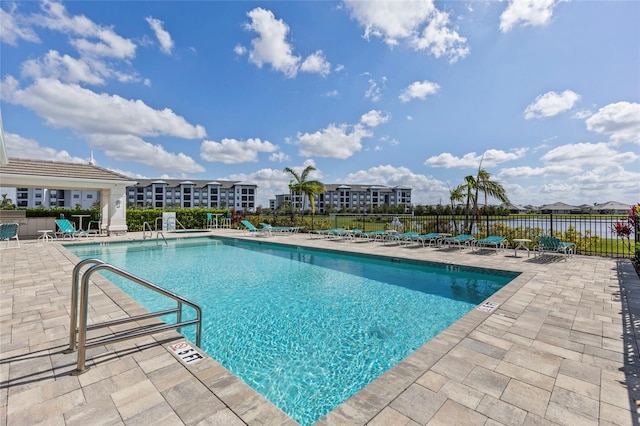 view of pool featuring a patio