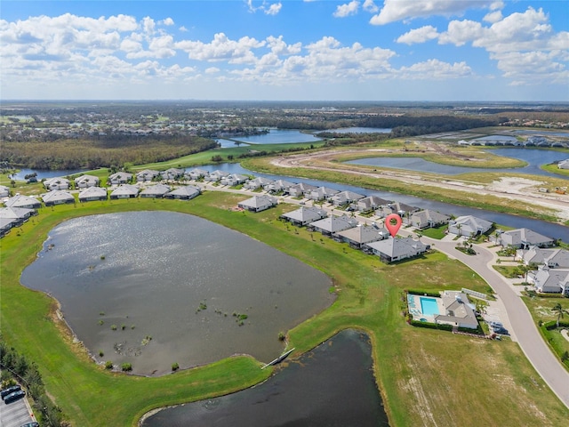 drone / aerial view with a water view