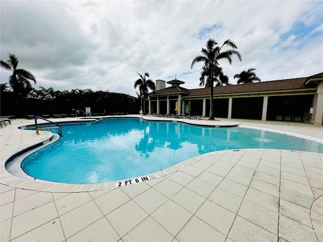 view of pool with a patio