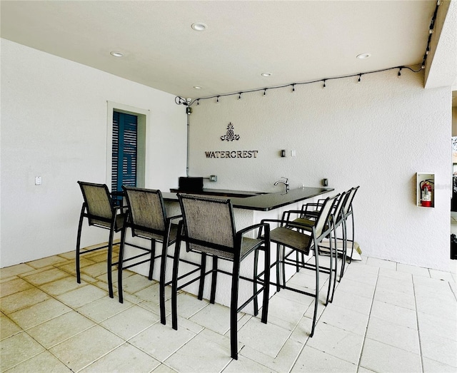 dining room featuring light tile patterned flooring