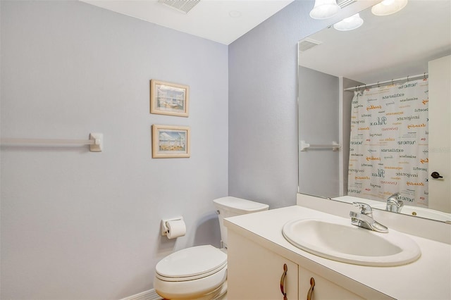 9320 Clubside Cir Unit 2109, Sarasota, FL 34238 - bathroom with toilet, vanity, and curtained shower