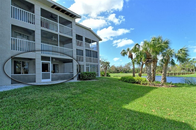 view of yard featuring a balcony