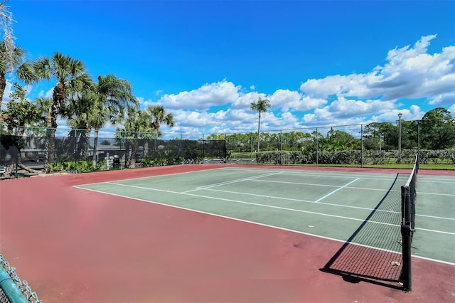 view of sport court featuring basketball hoop