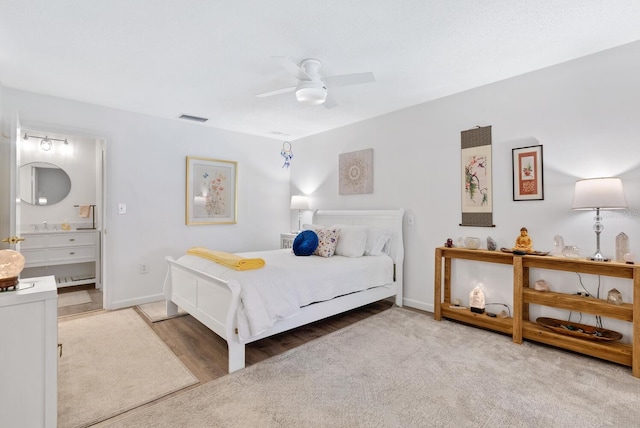 bedroom with hardwood / wood-style floors and ceiling fan