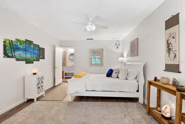 bedroom featuring wood-type flooring and ceiling fan