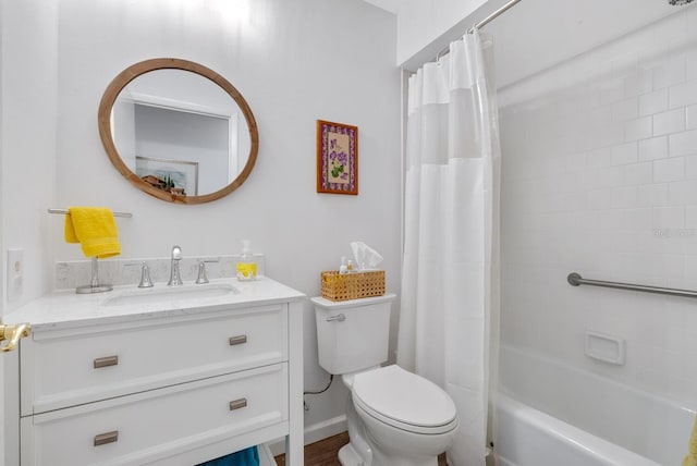 full bathroom with vanity, toilet, and shower / tub combo