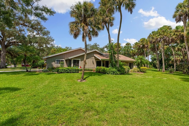 exterior space with a yard