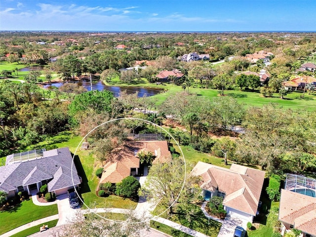 drone / aerial view with a water view