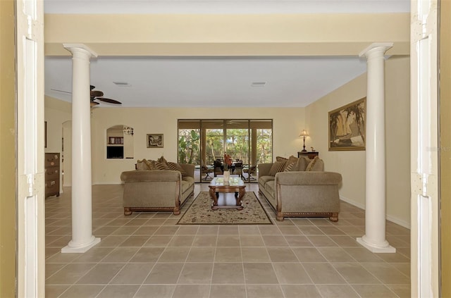 tiled living room with ornate columns and ceiling fan