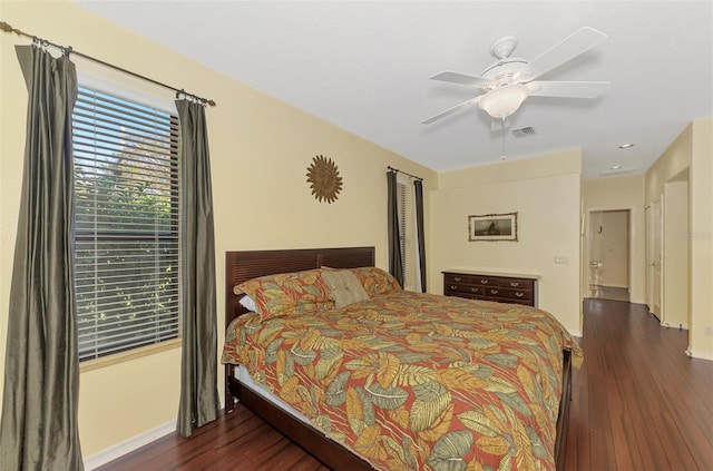 bedroom featuring dark wood-type flooring and ceiling fan