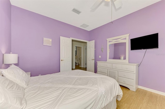 bedroom featuring light wood-type flooring and ceiling fan