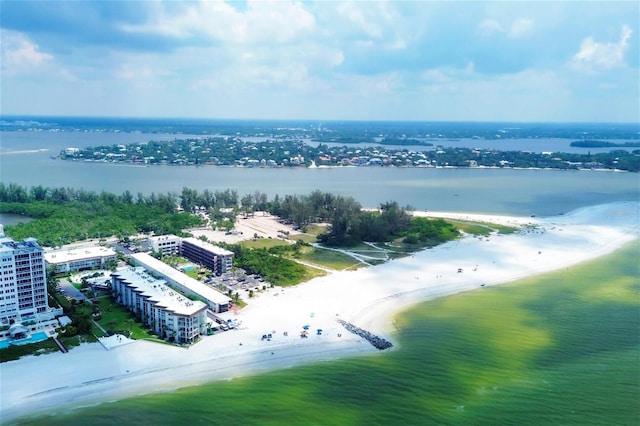 bird's eye view featuring a water view and a view of the beach