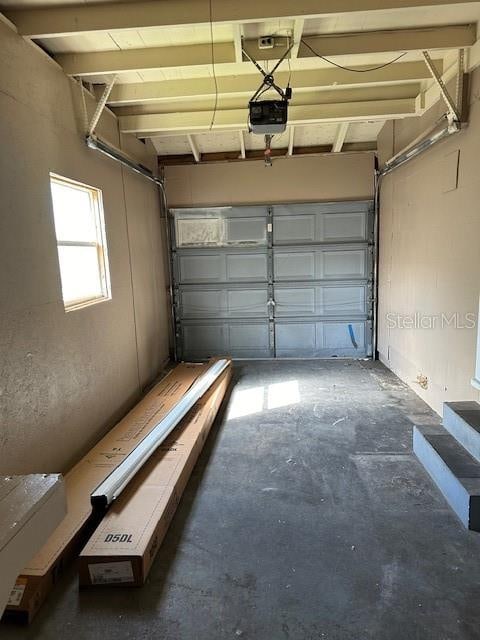 garage featuring a garage door opener