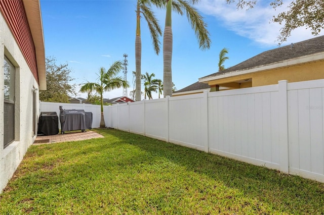 view of yard with a patio area