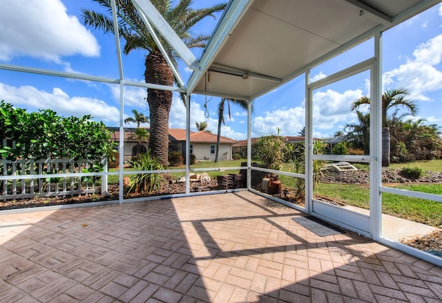 unfurnished sunroom with a healthy amount of sunlight