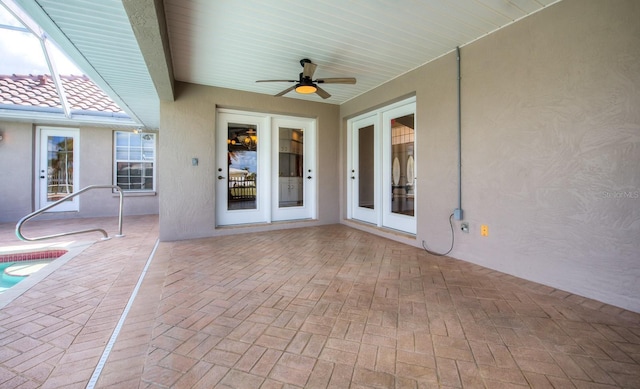 view of patio / terrace with ceiling fan and french doors